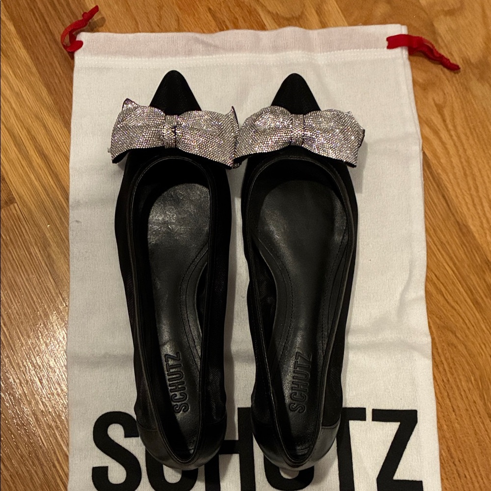 SCHUTZ Black Pointed Ballet Flats with Crystal Bow Accent